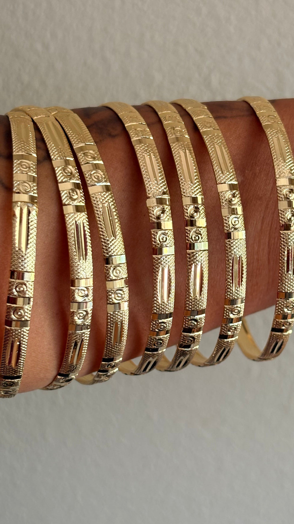 GOLD BANGLES