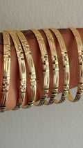 GOLD BANGLES